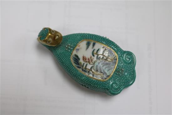 A 19th Century Chinese enamelled porcelain belt hook, pseudo Qianlong mark